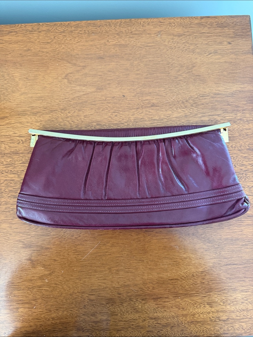 Vintage Burgundy Soft Leather Clutch with Gold Tone Metal Frane